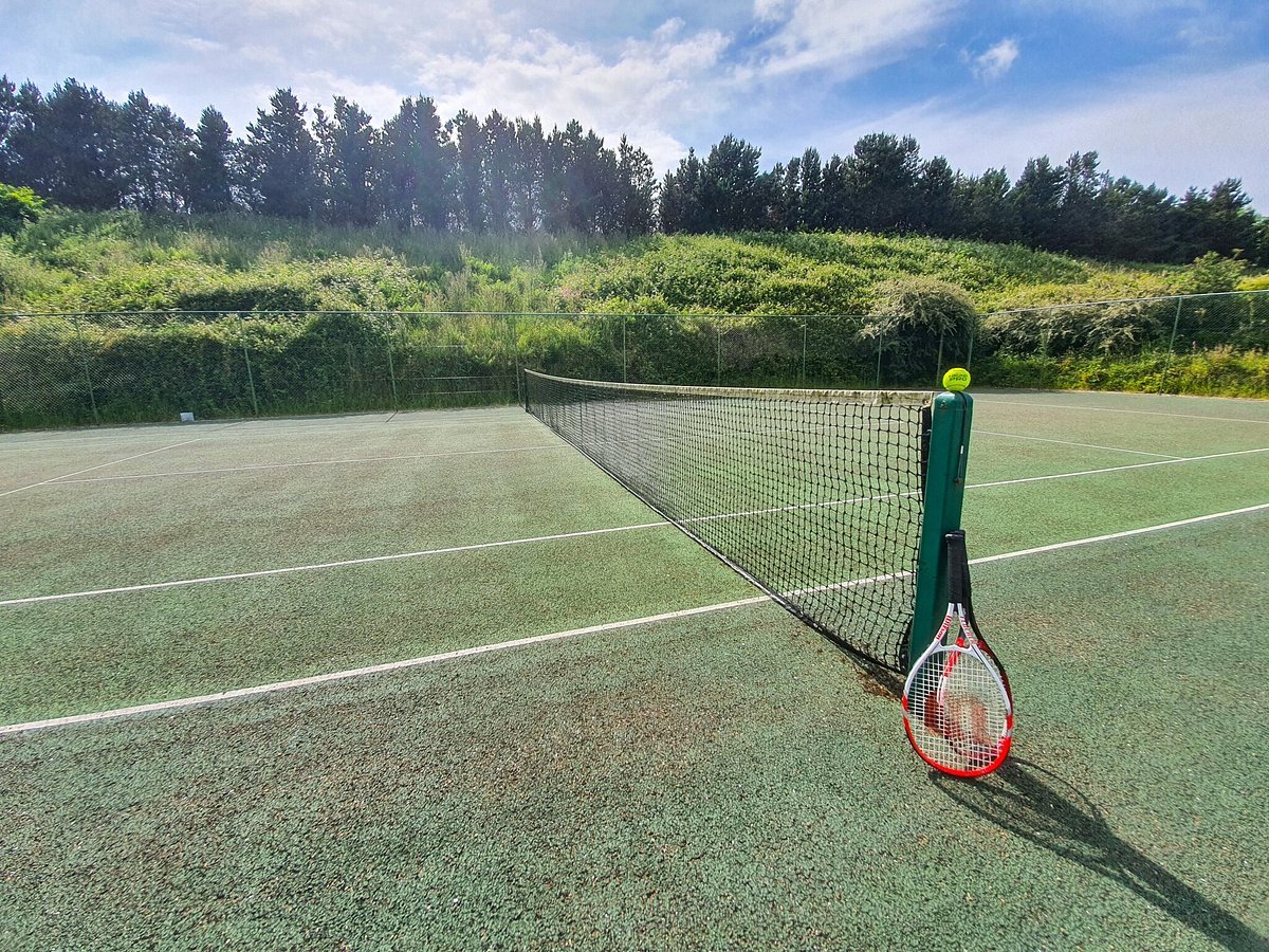 Tennis courts and mini-golf area at Hustyns