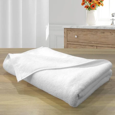 Fluffy white towels neatly folded